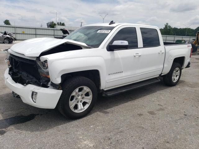 CHEVROLET SILVERADO 2018 with VIN 3GCUKREC5JG290249 - Photo from auction