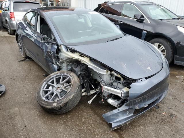 Photo 4 from auction – 2022 TESLA MODEL 3 with VIN 5YJ3E1EB3NF275854