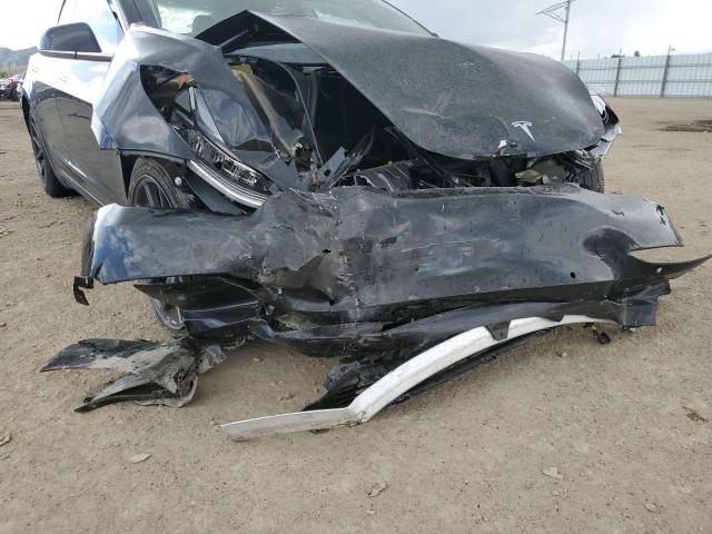 Photo 12 from auction – 2018 TESLA MODEL 3 with VIN 5YJ3E1EA7JF078381