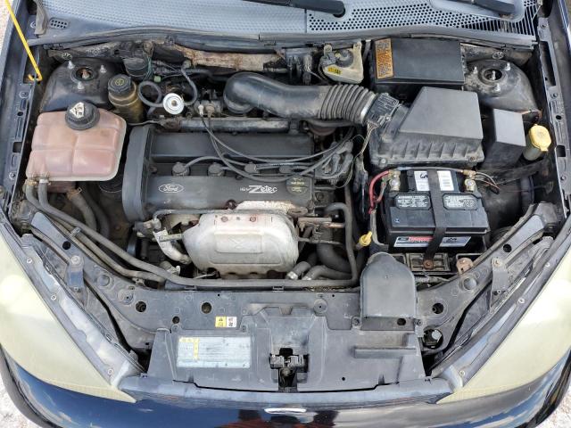 Photo 11 from auction – 2003 FORD FOCUS SE with VIN 1FAHP36323W232155