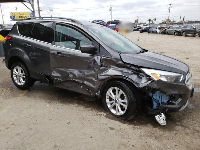 Photo 4 from auction – 2018 FORD ESCAPE SE with VIN 1FMCU0GD2JUA10402