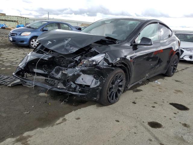 TESLA MODEL Y 2022 with VIN 7SAYGDEE7NF555162 - Photo from auction