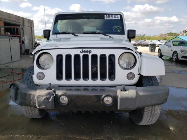 Photo 5 from auction – 2014 JEEP WRANGLER U with VIN 1C4BJWEG1EL180965
