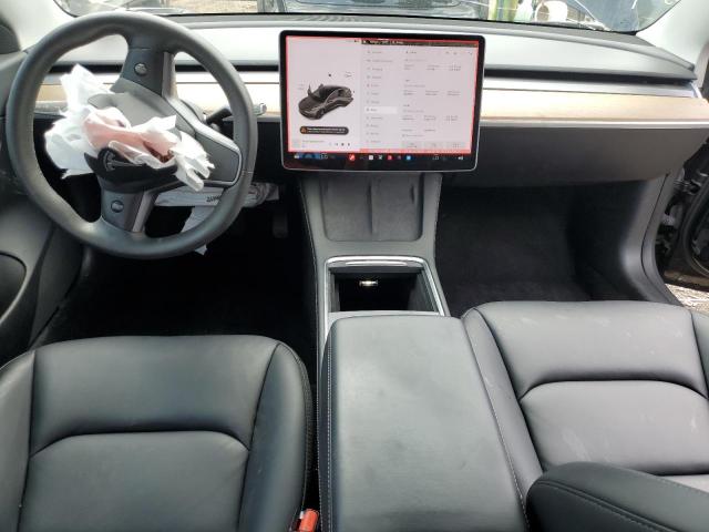 Photo 8 from auction – 2021 TESLA MODEL 3 with VIN 5YJ3E1EA6MF859302