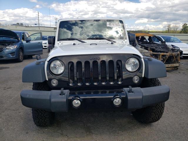 Photo 5 from auction – 2016 JEEP WRANGLER U with VIN 1C4BJWDG2GL123565