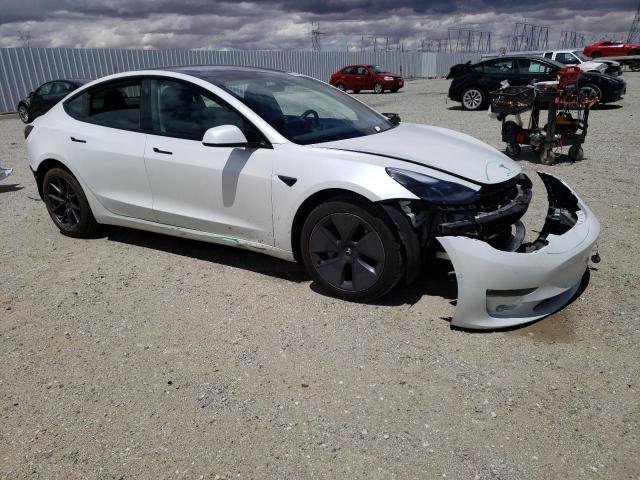 Photo 4 from auction – 2021 TESLA MODEL 3 with VIN 5YJ3E1EB3MF974335