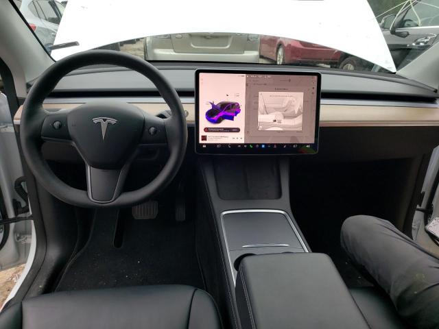 Photo 8 from auction – 2022 TESLA MODEL Y with VIN 7SAYGDEEXNF385640