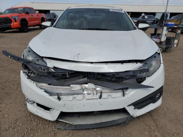 Photo 5 from auction – 2016 HONDA CIVIC EX with VIN 19XFC1F30GE034871