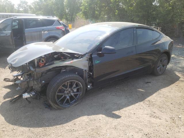TESLA MODEL 3 2022 with VIN 5YJ3E1EB0NF179034 - Photo from auction