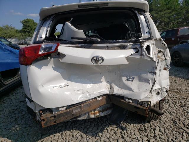 Photo 6 from auction – 2014 TOYOTA RAV4 XLE with VIN JTMRFREV6ED093718