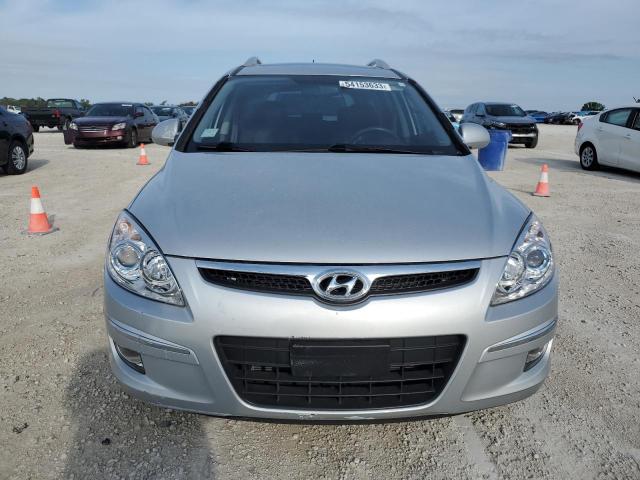 Photo 5 from auction – 2011 HYUNDAI ELANTRA TO with VIN KMHDC8AEXBU097054