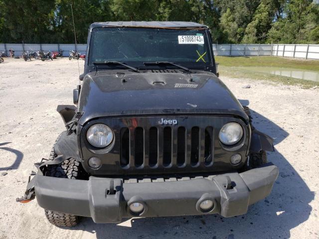 Photo 5 from auction – 2015 JEEP WRANGLER U with VIN 1C4BJWFG0FL535687