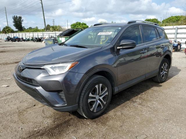 Photo 1 from auction – 2018 TOYOTA RAV4 LE with VIN JTMZFREV8JJ211568