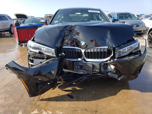 Photo 5 from auction – 2021 BMW 330XI with VIN 3MW5R7J0XM8B57496