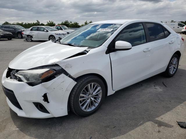 TOYOTA COROLLA L 2014 with VIN 5YFBURHE6EP023121 - Photo from auction