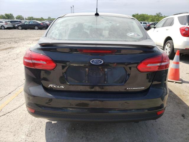 Photo 6 from auction – 2015 FORD FOCUS TITA with VIN 1FADP3J27FL310576