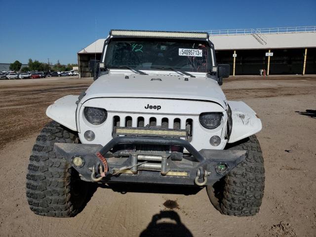 Photo 5 from auction – 2015 JEEP WRANGLER U with VIN 1C4BJWDG3FL596955