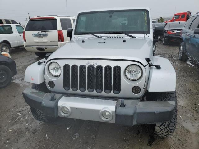 Photo 5 from auction – 2011 JEEP WRANGLER U with VIN 1J4HA5H10BL558016