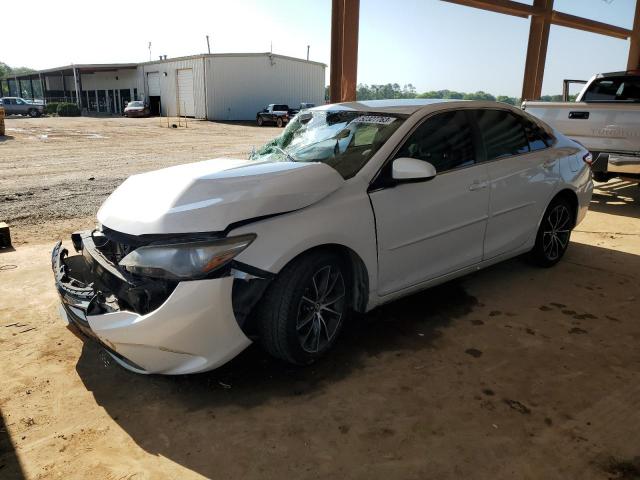 TOYOTA CAMRY LE 2016 with VIN 4T1BF1FK8GU116521 - Photo from auction