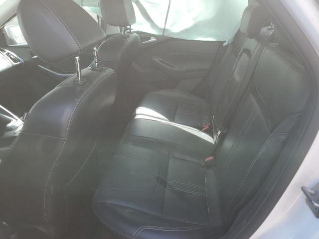 Photo 10 from auction – 2014 FORD FOCUS TITA with VIN 1FADP3J22EL346769