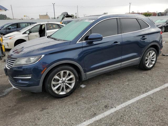 LINCOLN MKC 2015 with VIN 5LMCJ1A9XFUJ05555 - Photo from auction