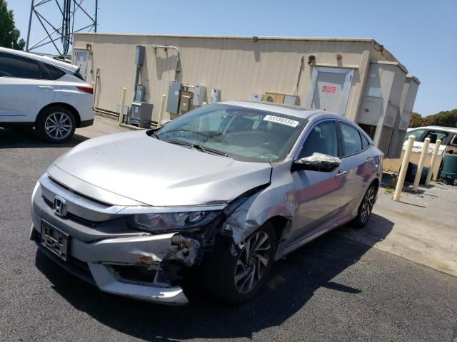 HONDA CIVIC EX 2018 with VIN 2HGFC2F84JH509727 - Photo from auction