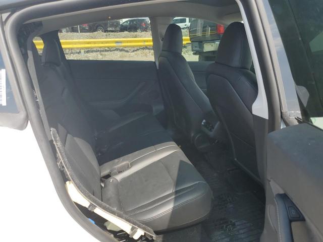 Photo 11 from auction – 2023 TESLA MODEL Y with VIN 7SAYGDEE9PA030796