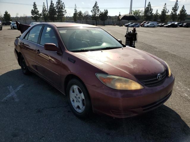 Photo 4 from auction – 2002 TOYOTA CAMRY LE with VIN 4T1BE30K12U057683