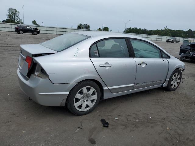 Photo 3 from auction – 2011 HONDA CIVIC LX with VIN 19XFA1F53BE036713