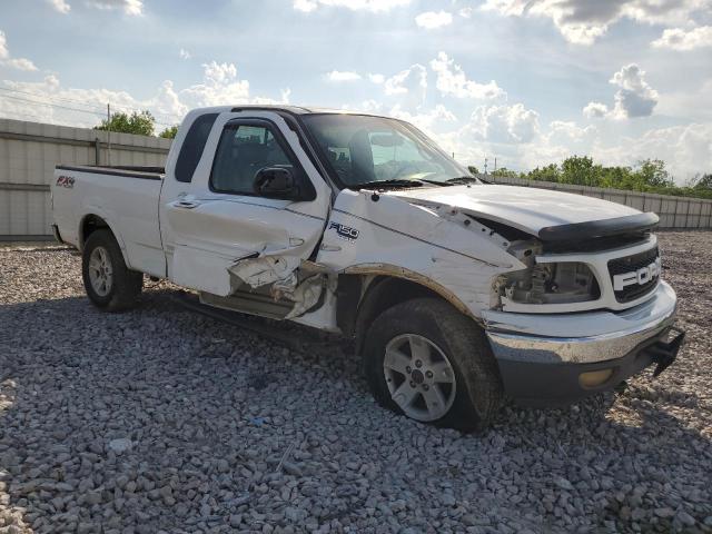 Photo 4 from auction – 2002 FORD F150 with VIN 1FTRX18L12NA75173