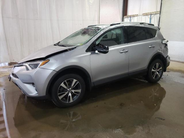 TOYOTA RAV4 XLE 2017 with VIN 2T3RFREV0HW650386 - Photo from auction