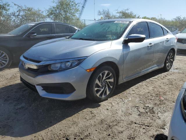 HONDA CIVIC EX 2018 with VIN 2HGFC2F79JH519256 - Photo from auction