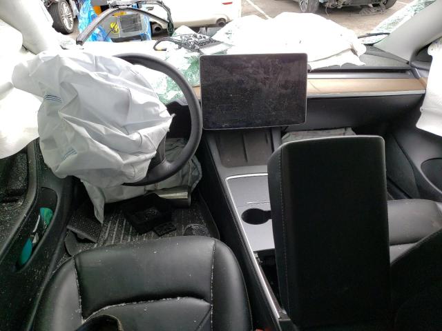 Photo 8 from auction – 2021 TESLA MODEL 3 with VIN 5YJ3E1EA3MF977890