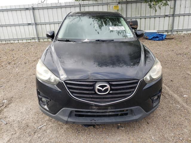 Photo 5 from auction – 2016 MAZDA CX-5 SPORT with VIN JM3KE2BY0G0637271