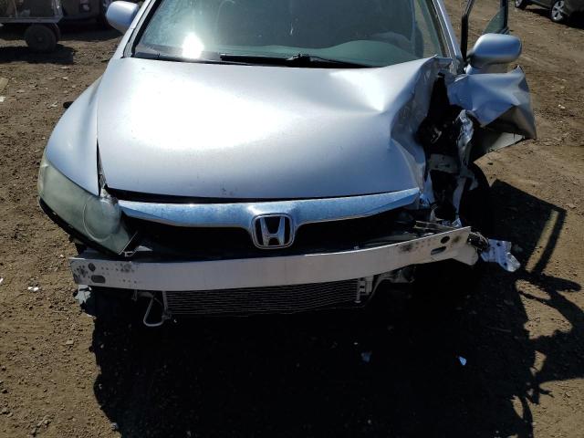 Photo 11 from auction – 2011 HONDA CIVIC LX with VIN 19XFA1F59BE026610