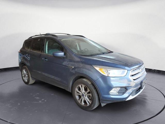 Photo 4 from auction – 2018 FORD ESCAPE SEL with VIN 1FMCU9HD3JUA99559