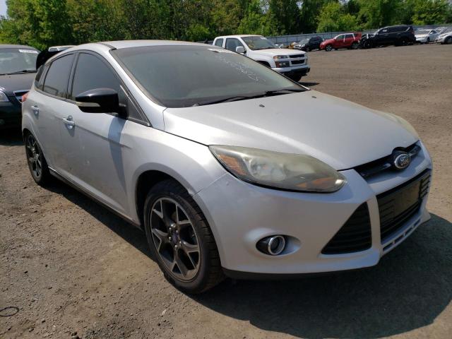 Foto 4 de la subasta – 2014 FORD FOCUS SE con VIN 1FADP3K22EL191087