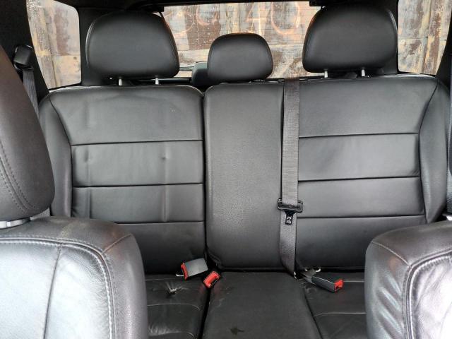 Photo 10 from auction – 2011 FORD ESCAPE LIM with VIN 1FMCU9EG2BKB38170