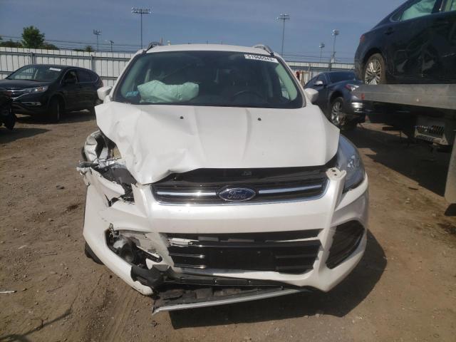 Photo 5 from auction – 2015 FORD ESCAPE TIT with VIN 1FMCU9J91FUC29142