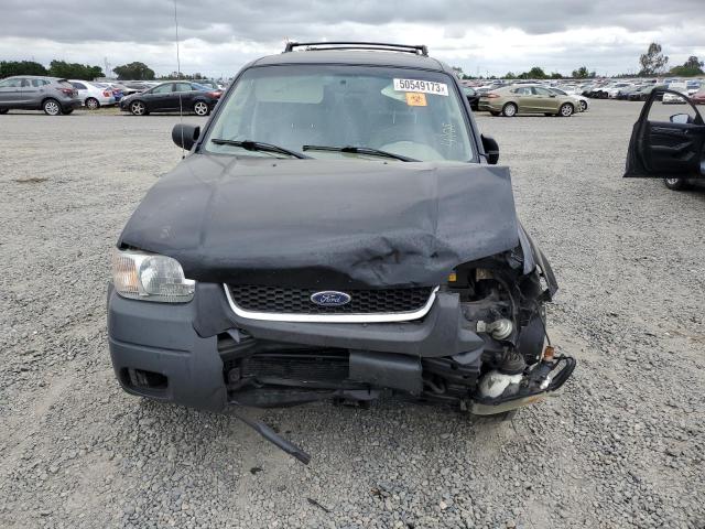Photo 5 from auction – 2003 FORD ESCAPE XLT with VIN 1FMYU93153KE03251