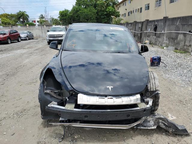Photo 5 from auction – 2022 TESLA MODEL Y with VIN 7SAYGDEF3NF521955