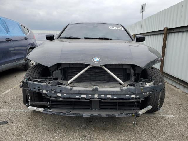 Photo 5 from auction – 2019 BMW 330I with VIN WBA5R1C50KFH00299