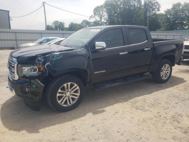 GMC CANYON SLT 2017 with VIN 1GTP6DE16H1231996 - Photo from auction