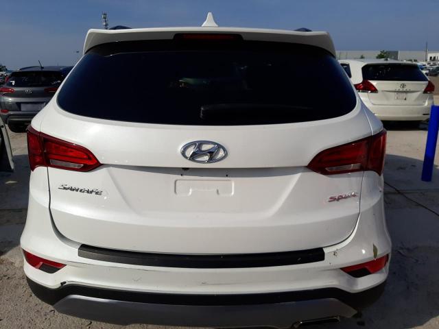 Photo 6 from auction – 2018 HYUNDAI SANTA FE S with VIN 5NMZU3LB8JH075864