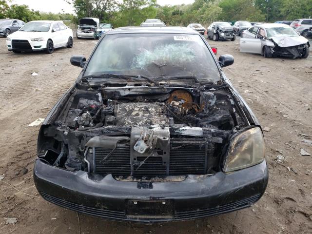 Photo 5 from auction – 2005 CADILLAC DEVILLE with VIN 1G6KD54Y55U117134