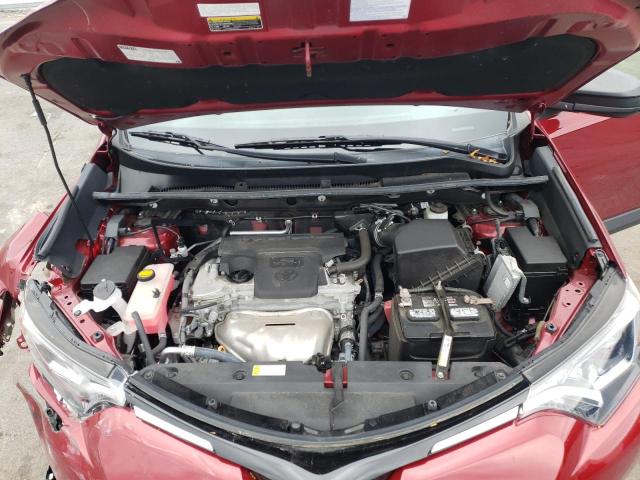 Photo 12 from auction – 2018 TOYOTA RAV4 LE with VIN 2T3BFREV1JW775338
