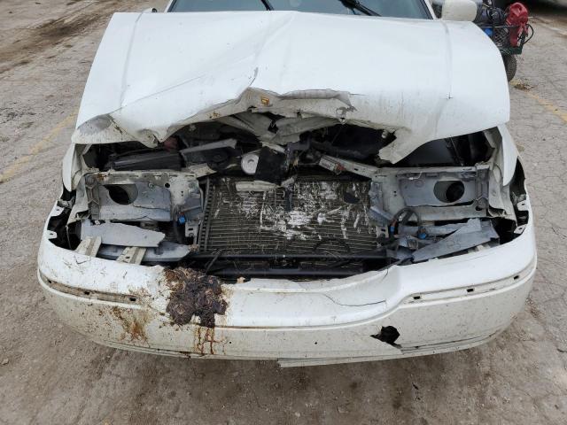 Photo 11 from auction – 2003 LINCOLN TOWN CAR E with VIN 1LNHM81WX3Y680077