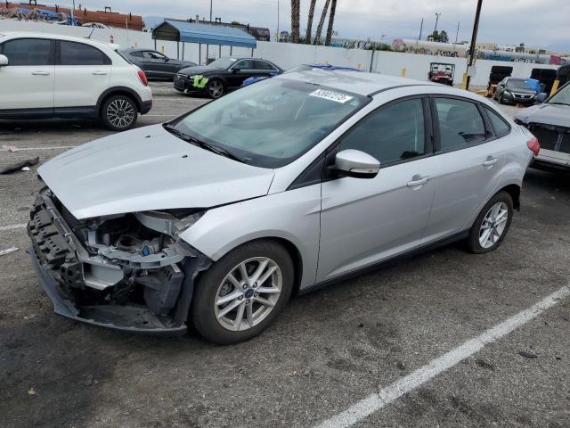 FORD FOCUS SE 2016 with VIN 1FADP3F25GL352819 - Photo from auction