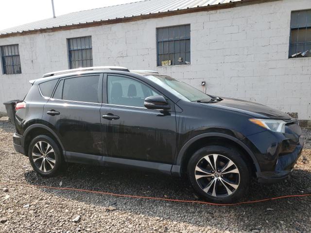 Photo 4 from auction – 2016 TOYOTA RAV4 XLE with VIN 2T3RFREV7GW477366