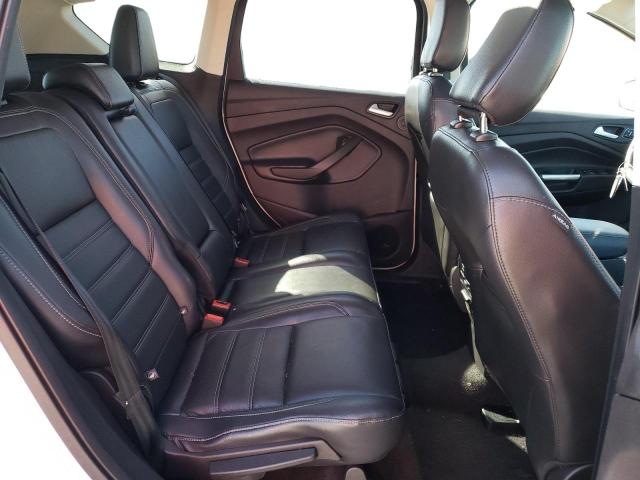 Photo 11 from auction – 2018 FORD ESCAPE TIT with VIN 1FMCU9J95JUC58894